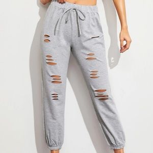 Grey holed sweatpants